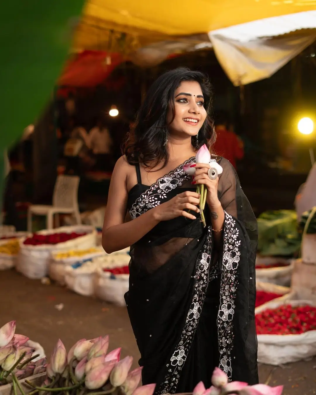 Vasanthi Krishnan Wearing Black Saree Sleeveless Blouse